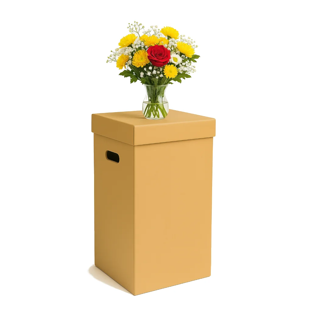 Vase contenant des fleurs posé sur un carton penderie